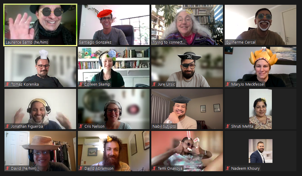 A zoom call grid featuring our diverse, global team applying an assortment of hat filters from pirates, to chefs, and chicken.